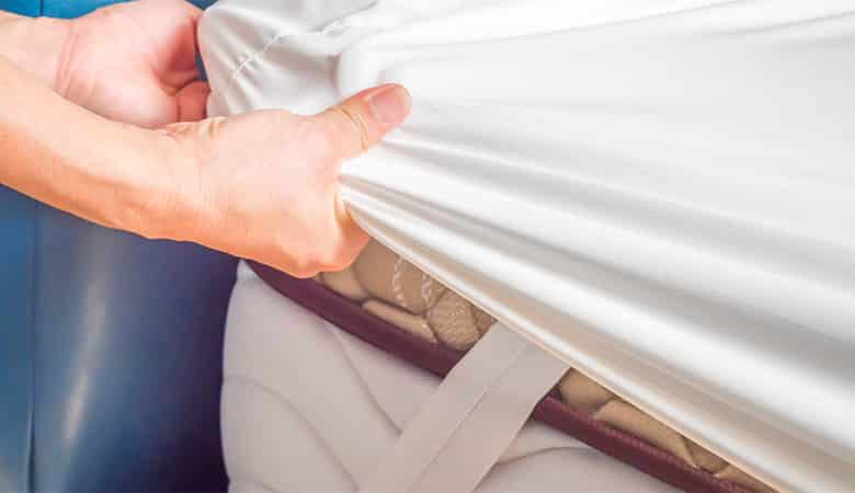 keep a mattress pad from moving