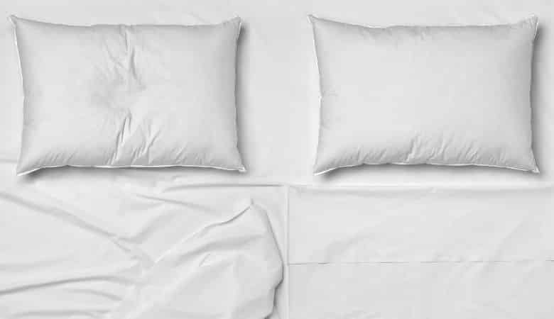 why do we sleep on pillows